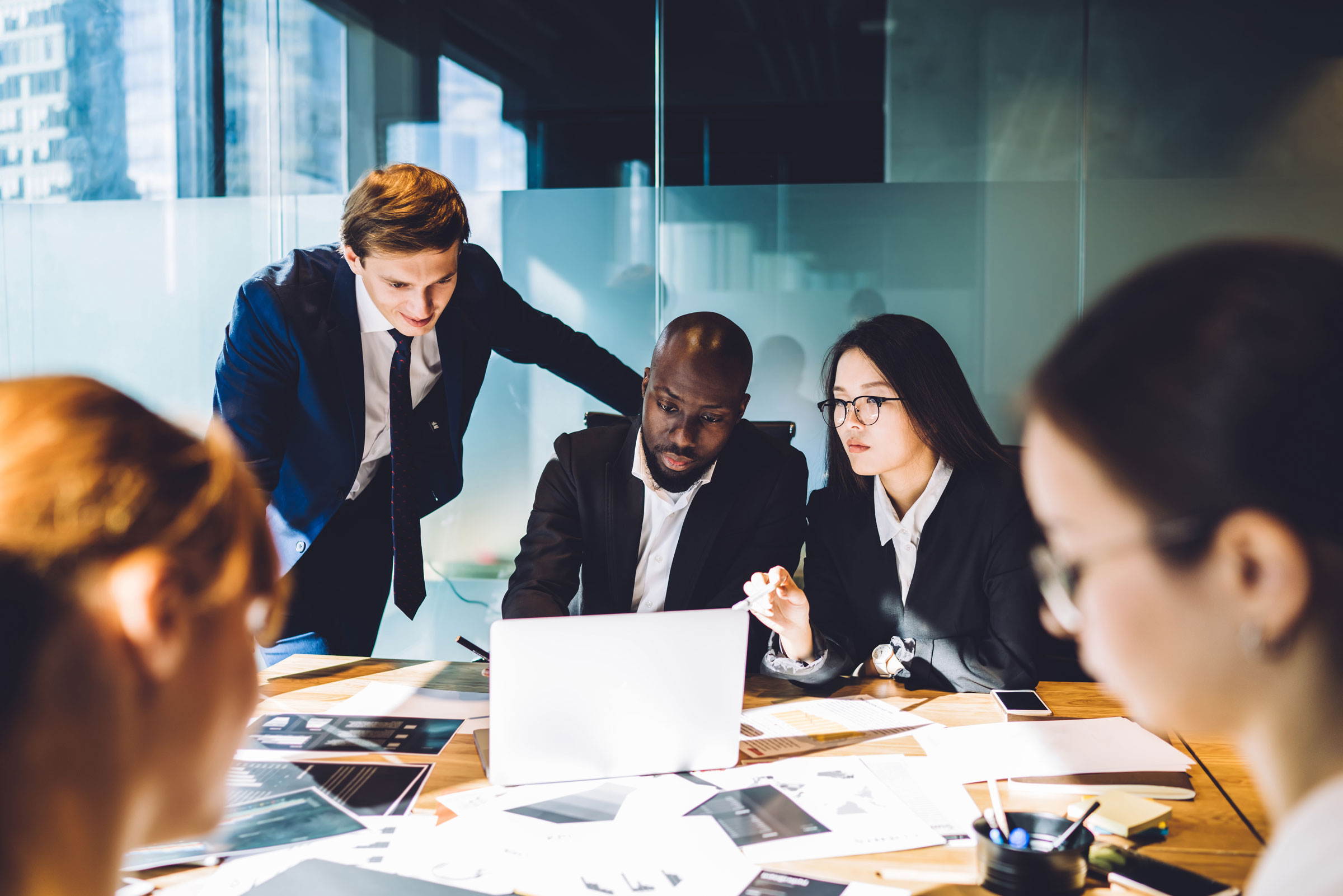 conference room of employees working together on a project