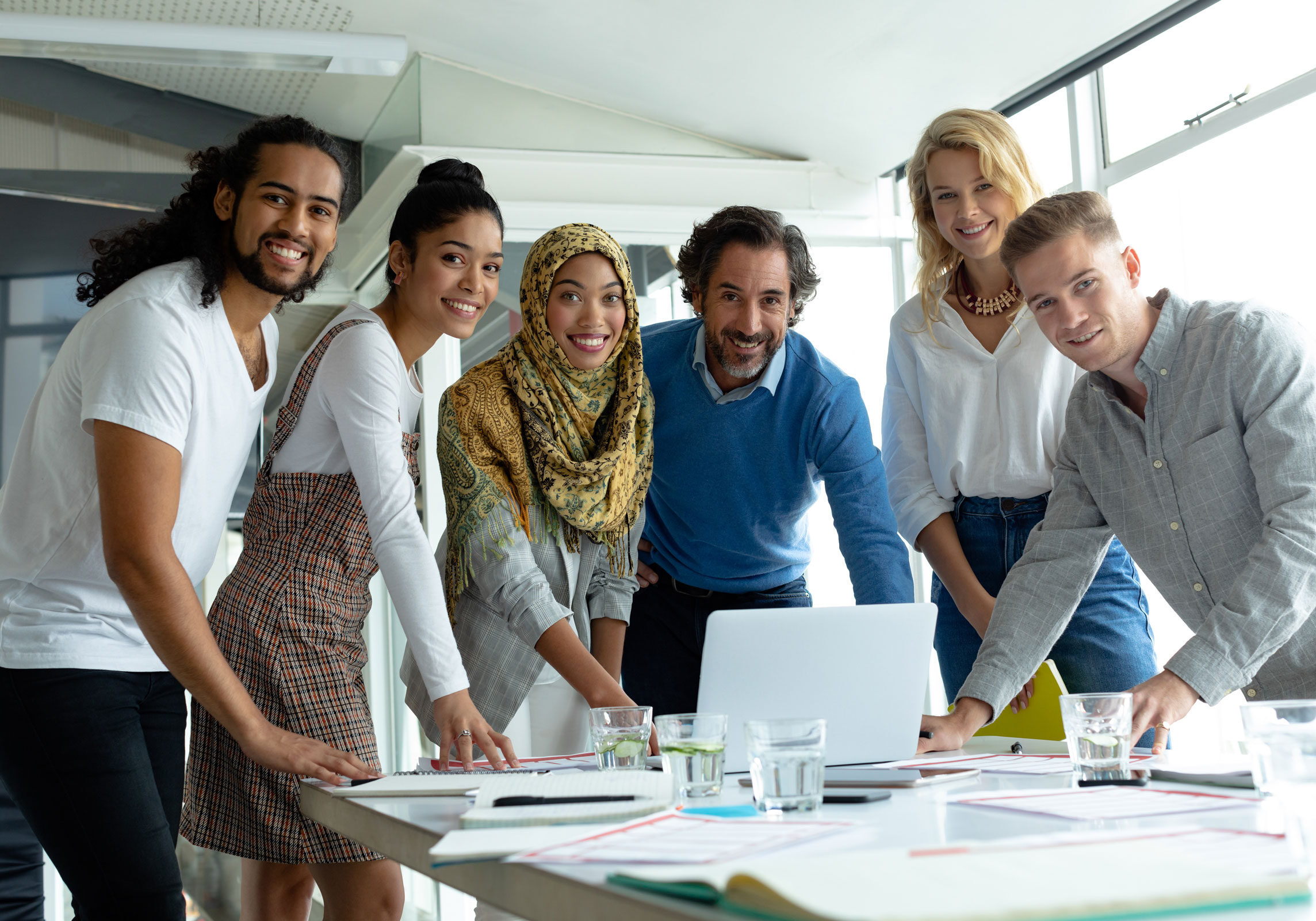 corporate employees working well together in a modern office